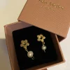 Flower and pearl dangle studs