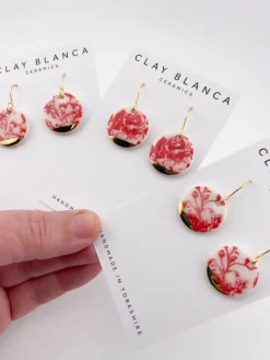 Round Red China Dangles with gold tips
