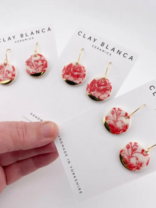Round Red China Dangles with gold tips